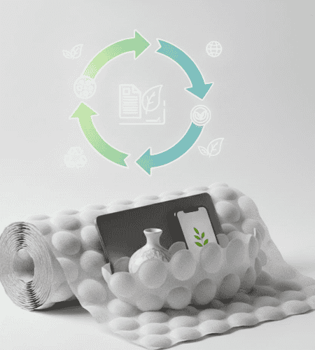 Paper-based bubble wrap roll and cushioning material protecting a phone, tablet, and vase, with a circular green and blue recycling arrow graphic above.